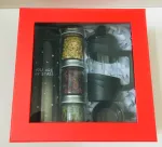 جعبه هاردباکس و شیشه‌های دمنوش به لیمو، چای ترش و بهارنارنج در ست هدیه فرنچ ست