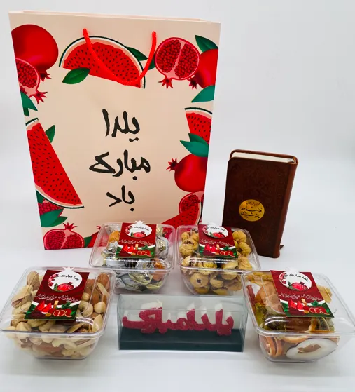 پک هدیه یلدایی Y119 شامل آجیل، میوه خشک، دیوان حافظ و شمع یلدا برای هدیه شب یلدا