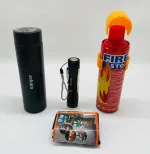 مجموعه چهار قلم لوازم ضروری خودرو شامل کپسول آتشنشانی، فلاسک استیل، چراغ قوه LED و کیف نظمدهنده