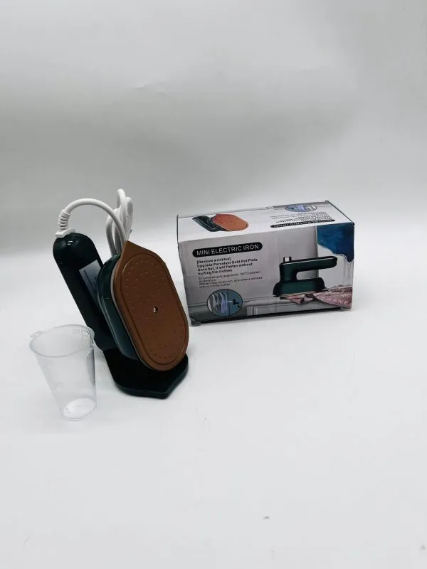 اتو مسافرتی mini electric iron با کابل برق و طراحی مناسب استفاده در فضاهای کوچک