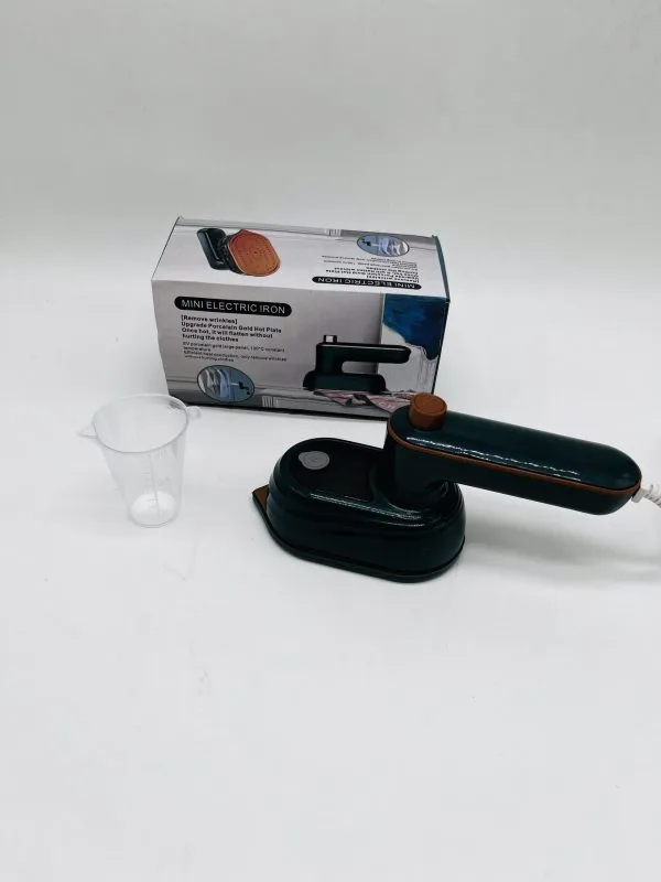 اتو مسافرتی بخار مدل mini electric iron مناسب صاف‌کردن لباس در سفر